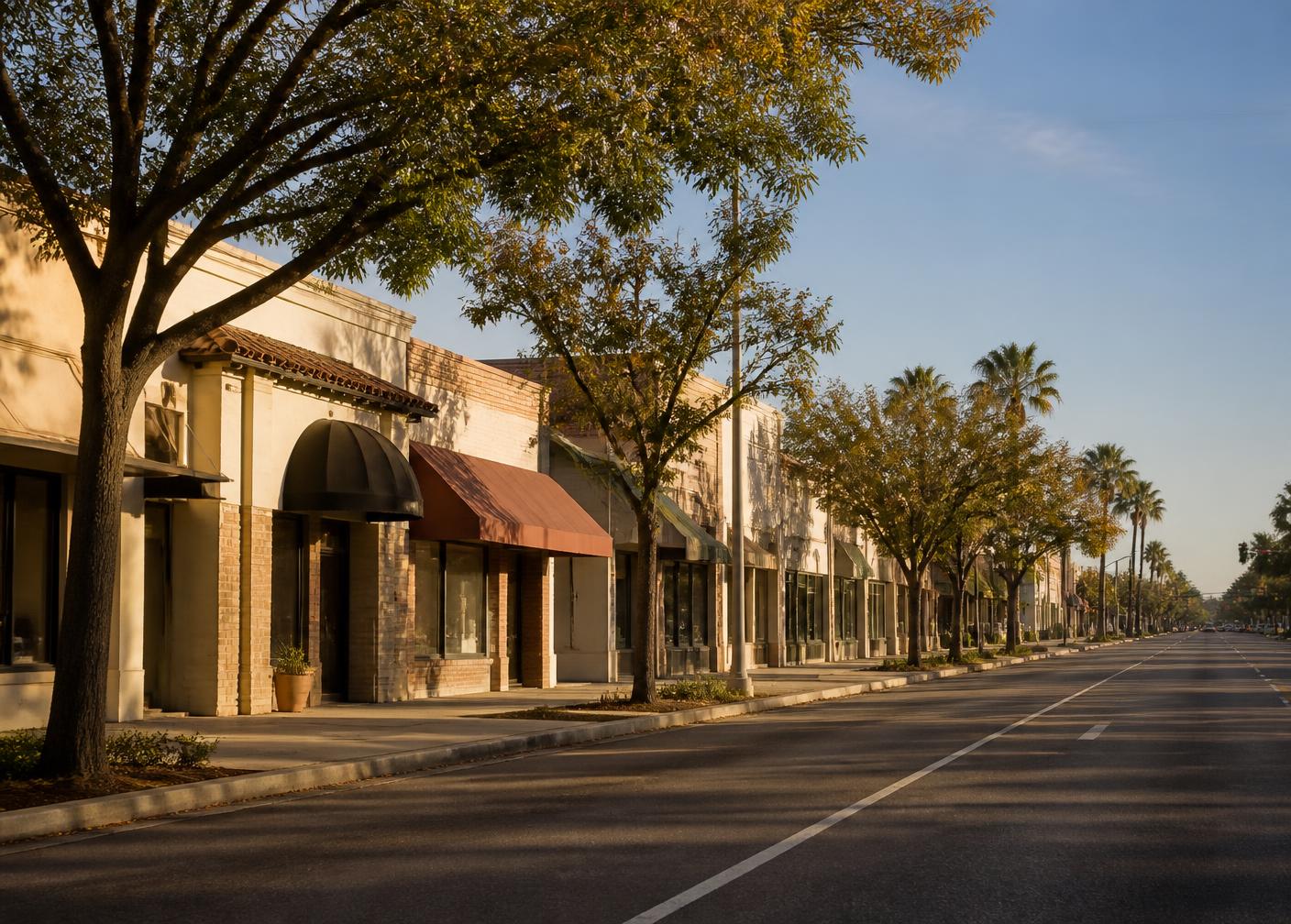 A Fresno neighborhood business corridor in warm afternoon Central Valley light